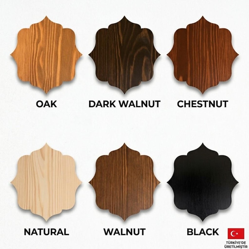 Pode incluir: Seis amostras de madeira em forma de quadrif&oacute;lio dispostas em duas filas. As cores est&atilde;o rotuladas como Oak, Dark Walnut, Chestnut, Natural, Walnut e Black. Cada amostra exibe um padr&atilde;o de gr&atilde;o de madeira e acabamento distintos.