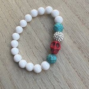 Red skull, turquoise and white jade beaded bracelet