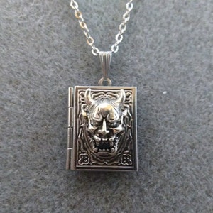 Japanese Hannya Mask Book Locket Necklace: Macabre Gift