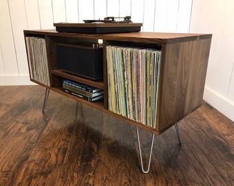 Solid walnut stereo and turntable cabinet with album storage. Mid century modern record player console with vinyl storage.