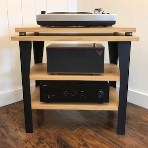 White oak stereo and turntable console with optional vinyl storage. Contemporary wood and steel record player stand.