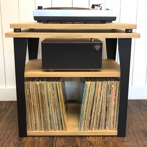 White oak stereo and turntable console with vinyl storage. Contemporary wood and steel record player stand.