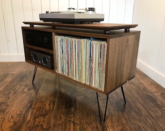 Solid walnut turntable and album storage cabinet. Mid century modern record player console with vinyl storage.