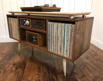 Solid walnut turntable and album storage cabinet, maple accents. Mid century modern record player console with vinyl storage.