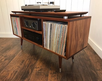 Solid mahogany turntable cabinet with album storage. Mid century modern record player console with vinyl storage.