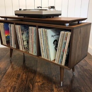 Solid walnut album storage cabinet with turntable platform. Mid century modern vinyl storage console.
