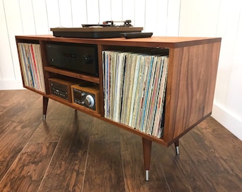 Solid mahogany turntable cabinet with album storage. Mid century modern record player console with vinyl storage.