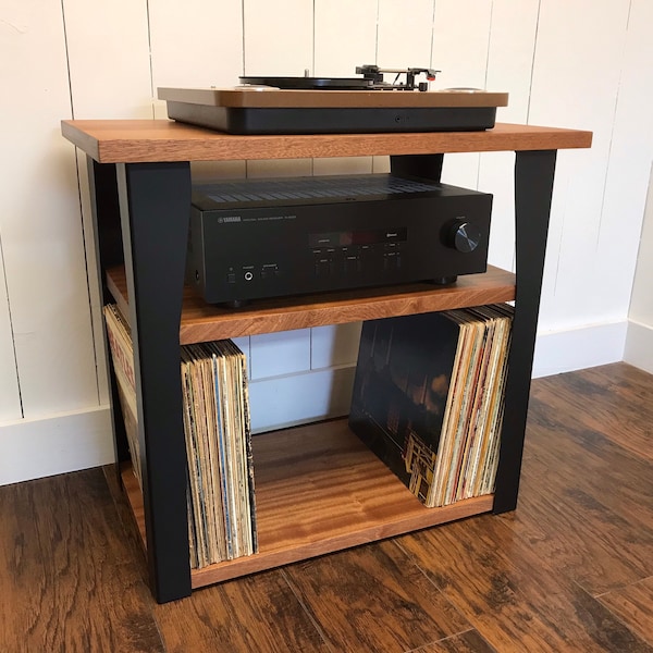 Mahogany stereo and turntable stand with vinyl storage. Modern record player console with contemporary steel legs.