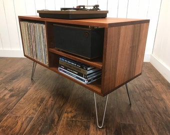 Solid mahogany turntable cabinet with album storage. Mid century modern record player console with vinyl storage.