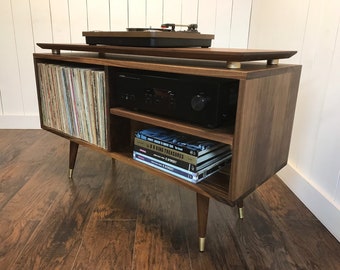 Solid walnut turntable and album storage cabinet. Mid century modern record player console with vinyl storage.