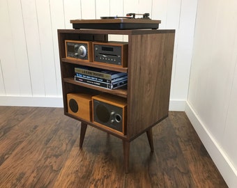 Solid walnut stereo and turntable cabinet with album storage. Mid century modern audio console with vinyl storage.