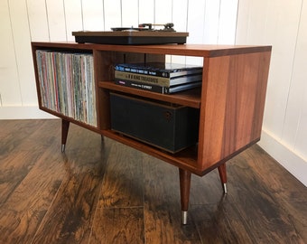 Solid mahogany turntable console. Mid century modern record player and stereo cabinet with album storage.