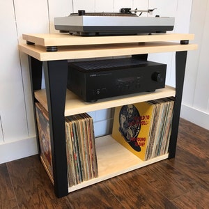 Maple stereo and turntable console with vinyl storage. Contemporary wood and steel record player stand.