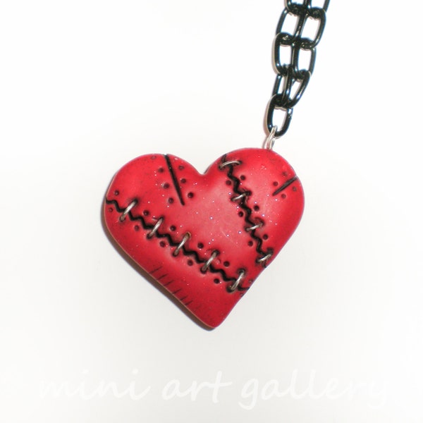 Steampunk Valentine red heart necklace / polymer clay stitched wounded scarred / black chain