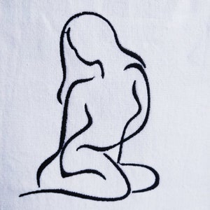 Op de afbeelding: Een zwarte lijntekening van een persoon die met gekruiste benen zit. De tekening is gemaakt in een minimalistische stijl.