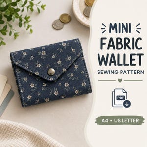 May include: A dark blue fabric wallet with a white floral pattern and a metal snap closure. The text reads MINI FABRIC WALLET SEWING PATTERN, PDF, and A4 US LETTER. The design features a triangular flap and a compact, rectangular shape.