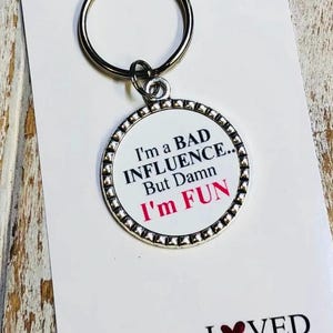Bad influence keychain • Damn I’m fun • Funny friendship keychain