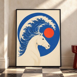 May include: A framed wall art print featuring a white horse profile against a large blue circle. The horse's mane is stylized as a crashing ocean wave, and a solid red circle is positioned to the right of the horse's head on a cream background.