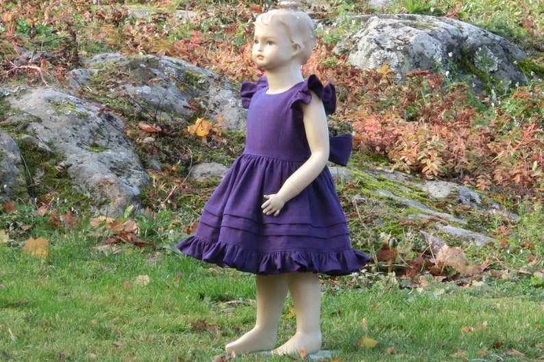 purple pinafore dress child