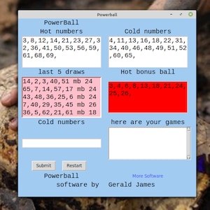 May include: A computer screen displaying a Powerball lottery software program. The screen shows hot and cold numbers, last 5 draws, hot bonus ball, and a text box for entering game selections. The software is by Gerald James.