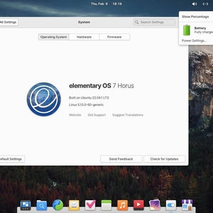 May include: A screenshot of the elementary OS 7 Horus operating system. The screen shows the system settings menu with options for operating system, hardware, and firmware. The background image is a mountain landscape. The battery is fully charged.