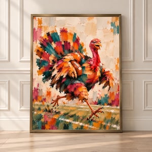 May include: A framed wall art print featuring an impressionistic painting of a turkey running across a field while carrying an American football. The turkey is rendered in vibrant, multi-colored brushstrokes of red, orange, teal, and yellow.