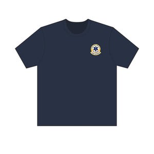 May include: A navy blue short-sleeve t-shirt featuring a circular emblem on the left chest. The emblem displays a blue Star of Life symbol on a white background, surrounded by yellow text that reads "BOSTON COUNTY EMS" and "CAAMP ACCREDITED".