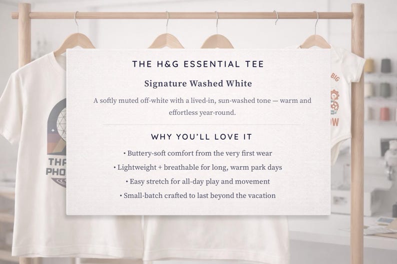 a collection of white t-shirts hanging on a wooden hanger, with a sign providing information about the t-shirts.