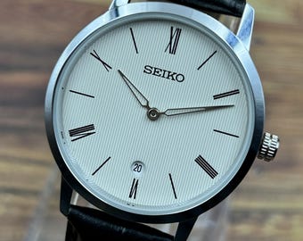 SEIKO セイコー5 腕時計 メンズ 自動巻きスクエア型 シルバーヴィンテージ ヴィンテージ セイコー5 自動巻き腕時計：スクエアゴールドアクセント