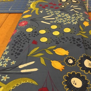 Clothworks Cotton Fabric Crocodile Smiles in dark blue with crocodiles flowers and plants by the half yard