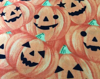 Northcott Cotton Fabric with Pumpkins for Halloween half yard cut in orange and black