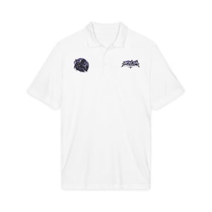May include: A white short-sleeved polo shirt featuring a collar and a button placket. On the left chest, there is a circular purple graphic of a hooded figure. On the right chest, there is a purple and black stylized logo with the text RAGE.