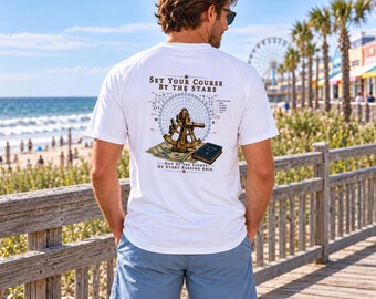 May include: A white short-sleeve t-shirt featuring a graphic on the back with a brass sextant, a compass rose, a map, and a dark blue book. The text reads: SET YOUR COURSE BY THE STARS and NOT BY THE LIGHTS OF EVERY PASSING SHIP.