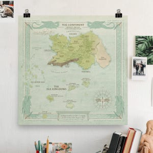 May include: A square fantasy map print titled The Continent and The Isle Kingdoms, featuring pale green landmasses, dark green dragon illustrations in the corners, a compass rose, and text detailing fictional geography and lore on a light background.