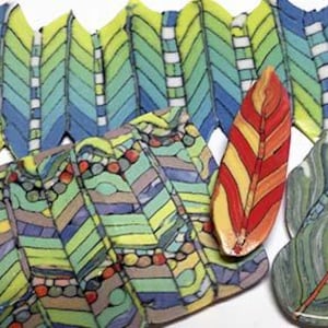 May include: A collection of flat, leaf-shaped ceramic pieces featuring vibrant, multi-colored patterns. The assortment includes a large blue and green chevron-style piece, a rectangular section with geometric shapes, and three smaller, distinct leaf-shaped items in red, orange, and muted green tones.