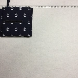 flip and go travel diaper changing pad/baby changing pad/travel diaper clutch with pockets white anchors on navy image 4