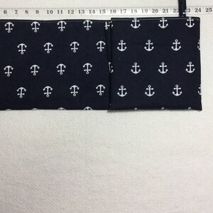 flip and go travel diaper changing pad/baby changing pad/travel diaper clutch with pockets white anchors on navy image 3