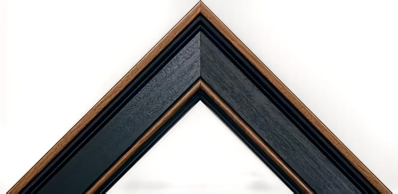 a triangle shaped picture frame with a wooden edge