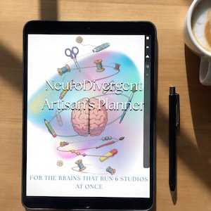 May include: A tablet displaying a digital planner titled NeuroDivergent Artisan's Planner: FOR THE BRAINS THAT RUN 6 STUDIOS AT ONCE. The screen features a central pink brain illustration surrounded by colorful craft supplies like scissors, thread, and pencils.