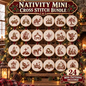 May include: A Nativity Mini Cross Stitch Bundle featuring 24 circular embroidery hoops with brown stitched religious icons on white fabric, displayed on a wooden rack with a sign reading Nativity Mini Cross Stitch Bundle.