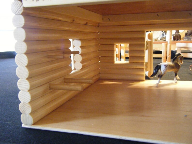 Log style horse barn