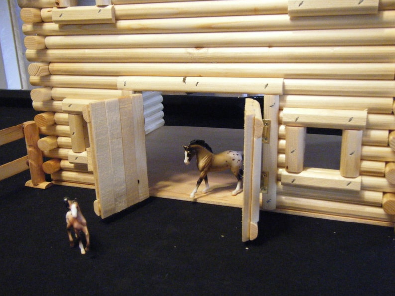 Log style horse barn