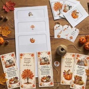 May include: A collection of autumn-themed stationery including lined writing paper, folded greeting cards, gift tags, and bookmarks. Each item features watercolor illustrations of pumpkins, fall foliage, and houses with inspirational text.