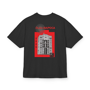 May include: A black short-sleeve t-shirt featuring a graphic on the back. The design includes a grey sunburst, the red text CLUJ NAPOCA, the number 2026, a black and white photograph of a tall apartment building, and a red arrow icon.