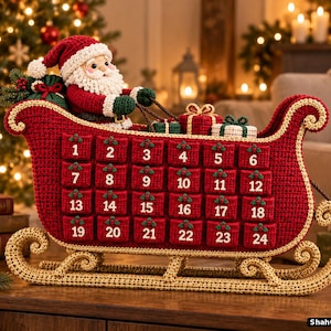 May include: A red and gold crocheted advent calendar shaped like a sleigh, featuring twenty-four small square pockets numbered one through twenty-four, each decorated with a green holly leaf. A crocheted Santa Claus sits inside the sleigh.