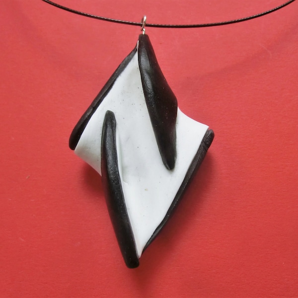 White black pointed  diamond shaped brooch pendant/ necklace or brooch/ polymere clay one side white other black/ hanging on pin or eye.