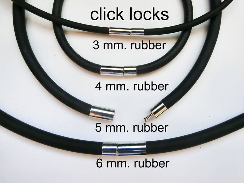 May include: Four black rubber cords with silver click locks. The cords are labeled with their diameter in millimeters: 3 mm, 4 mm, 5 mm, and 6 mm.