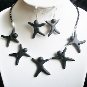 7 dancing gender puppets necklace/ earrings possible/ naughty  male and female polymer clay puppets holding hands/many possibilities