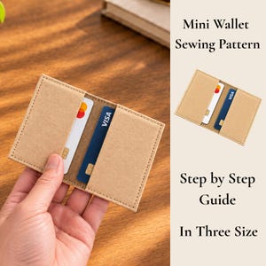 May include: A tan mini wallet sewing pattern featuring a step-by-step guide in three sizes. The wallet is made of a light brown material with visible stitching and holds two credit cards, one white and one blue, with visible Visa and Mastercard logos.
