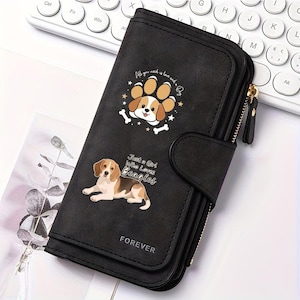 May include: A black wallet featuring a graphic of a beagle dog and a paw print with the text "All you need is love and a dog" and "Just a Girl Who Loves BEAGLES" printed on the front. The wallet includes a side zipper and the word "FOREVER" embossed.